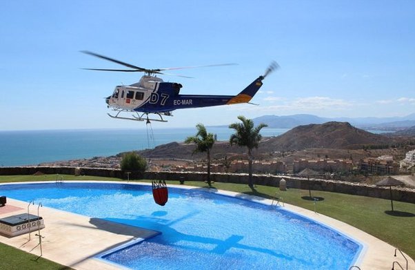 Fire Department Using Helicopter to Access Pool Water
