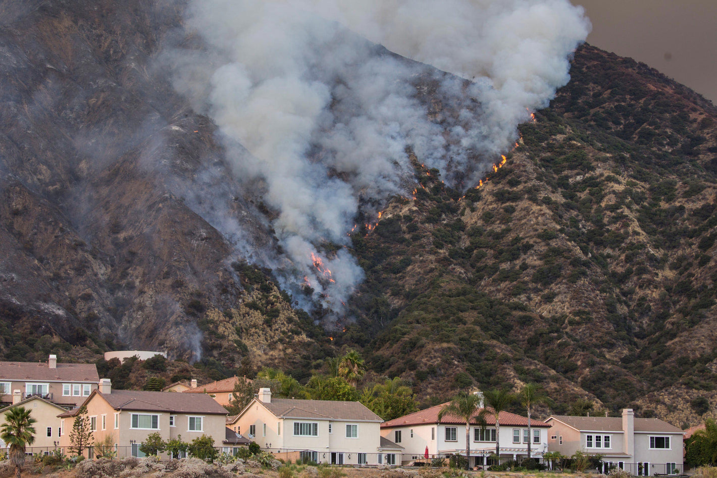 Fire on Hills by Pool Homes